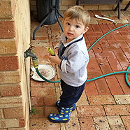 John loves playing with hoses